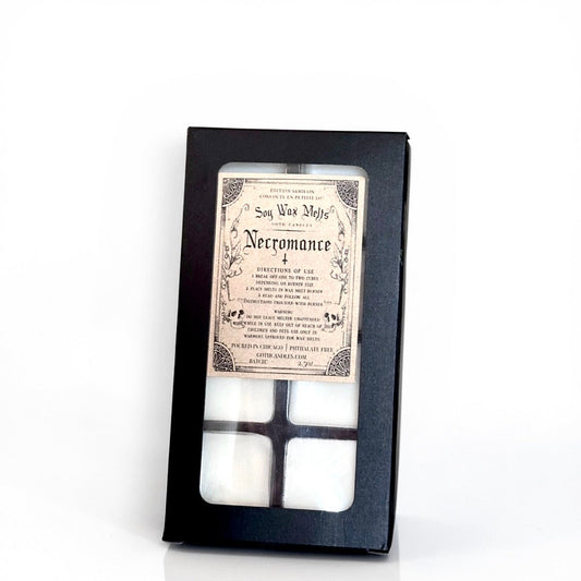 Box of white goth wax melts with a decorative label on a white background