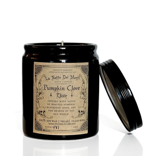 Black goth candle with a vintage-style label on a white background