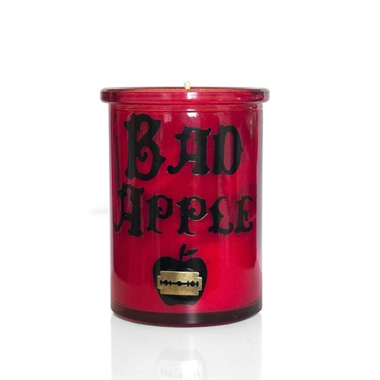 Red candle with 'Bad Apple' text and an apple graphic on a white background