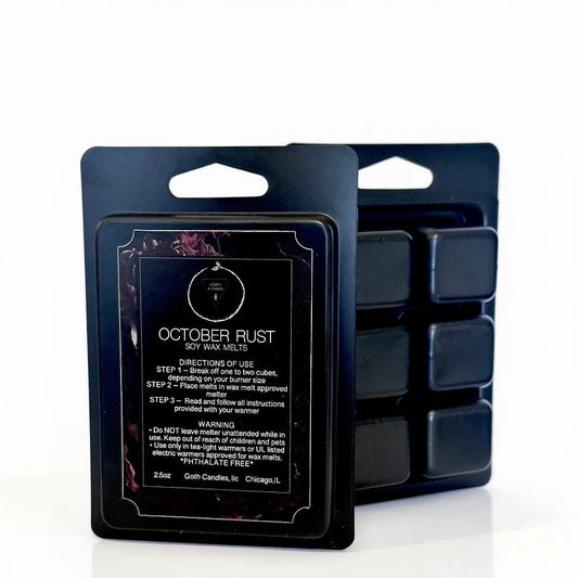 Black wax melt packaging with 'October Rust' branding on a white background