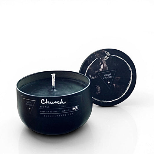 Black candle in a decorative container with 'Church' branding on a white background
