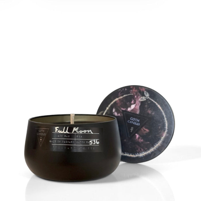 Black goth candle labeled 'Full Moon' with a decorative lid on a white background